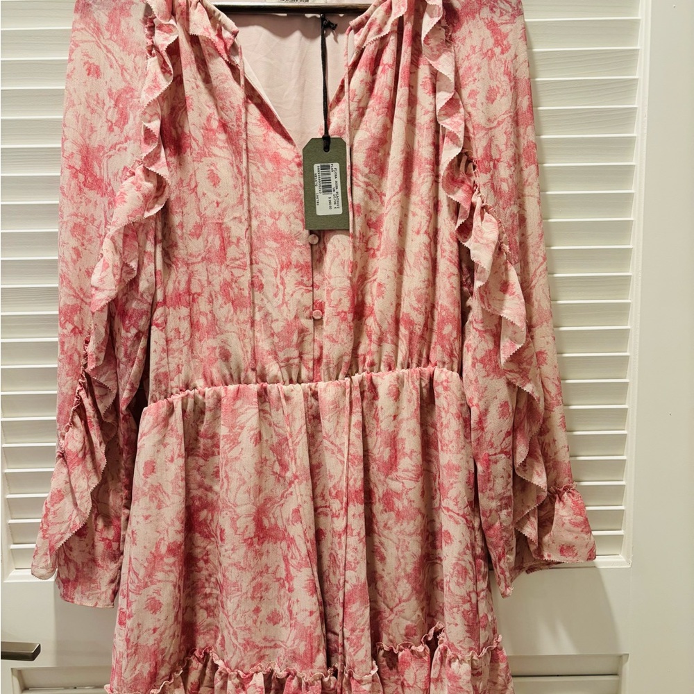 AllSaints Flora Rosa floral print ruffled playsuit.